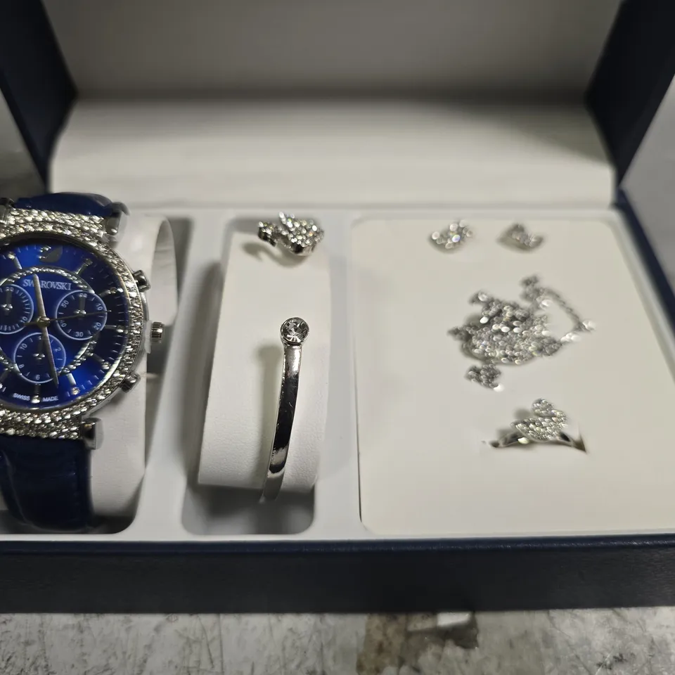 BOXED SWAROVSKI GIFT SET BOX TO INCLUDE - NAVY WATCH , EARRINGS , BANGLE ETC