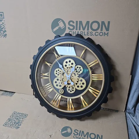 SKELETON GEAR WALL CLOCK – BLACK FRAME WITH GOLD ROMAN NUMERALS