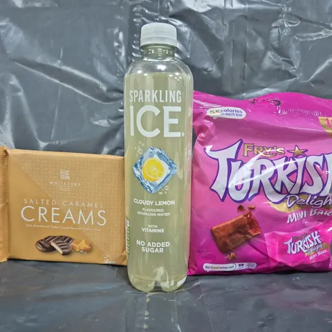 APPROXIMATELY 5 ASSORTED FOOD ITEMS TO INCLUDE TURKISH DELIGHT, CLOUDY LEMON FLAVOURED SPARKLING WATER, SALTED CARAMEL CREAMS, ETC