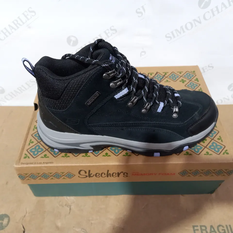 BOXED PAIR OF SKECHERS WALKING BOOTS- SIZE 7