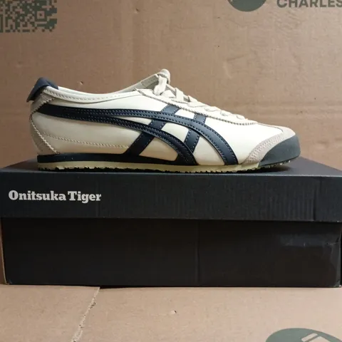 BOXED PAIR OF ONITSUKA TIGER TRAINERS IN BIRCH/NAVY SIZE UK 4.5