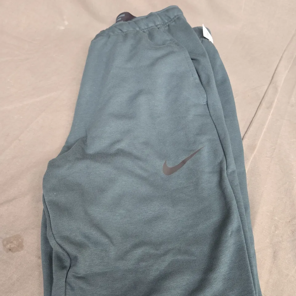 NIKE LOGO TRACKSUIT BOTTOMS SIZE M