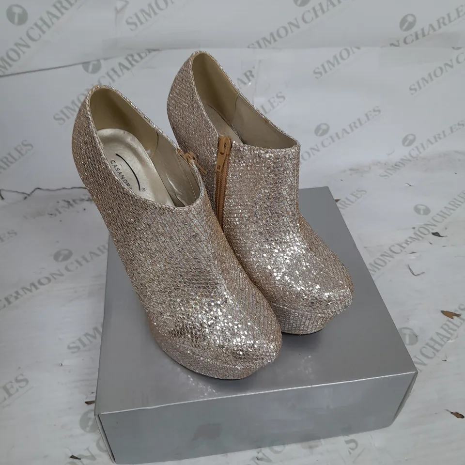 BOXED PAIR OF CASANDRA PLATFORM ANKLE HEEL IN GOLD SHIMMER SIZE 5