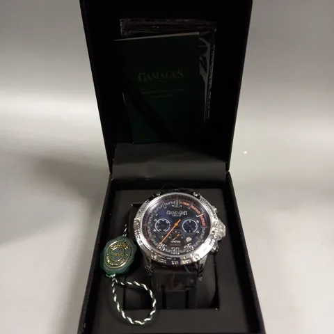 BOXED GAMAGES MECHANICAL RACER STEEL WATCH