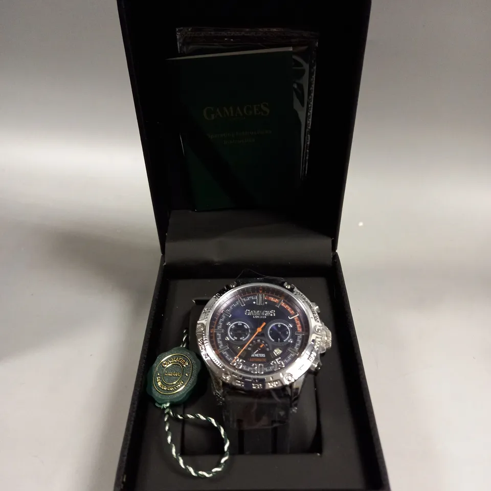 BOXED GAMAGES MECHANICAL RACER STEEL WATCH 