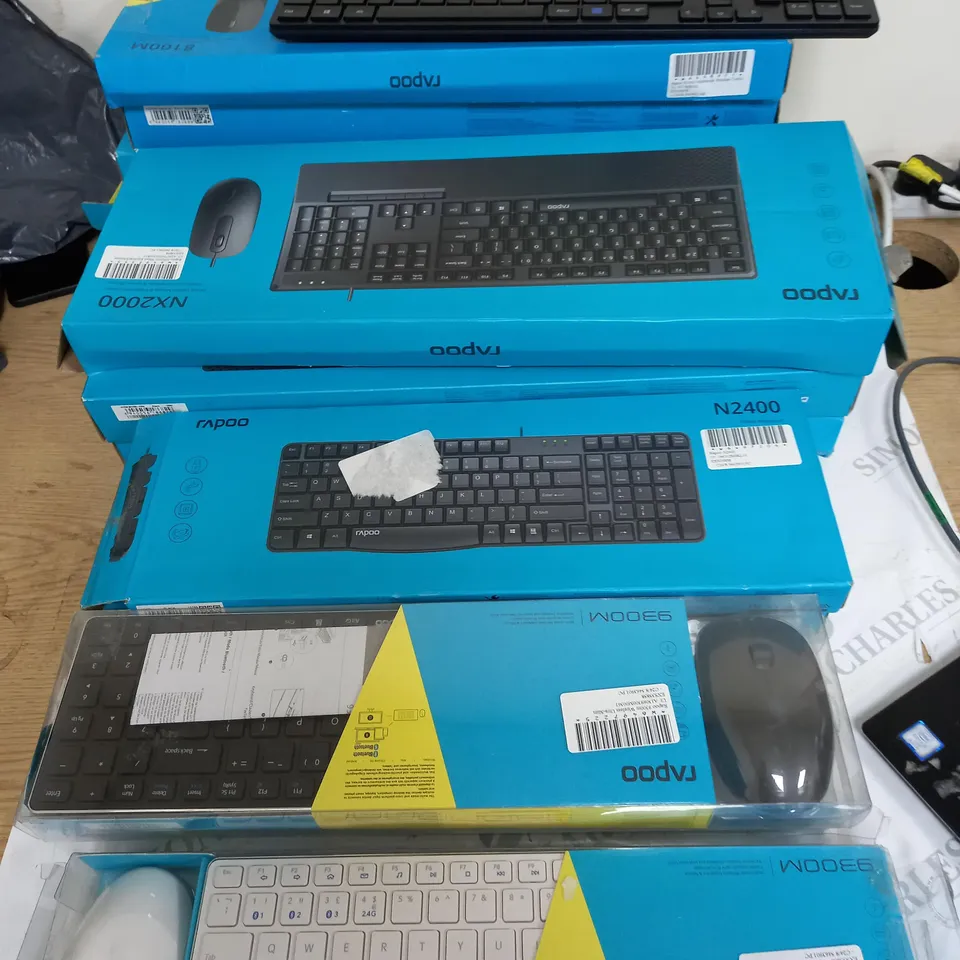 APPRROXIMETELY 13 ASSORTED RAPOO KEYBOARDS, SOME INCLUDING A MOUSE