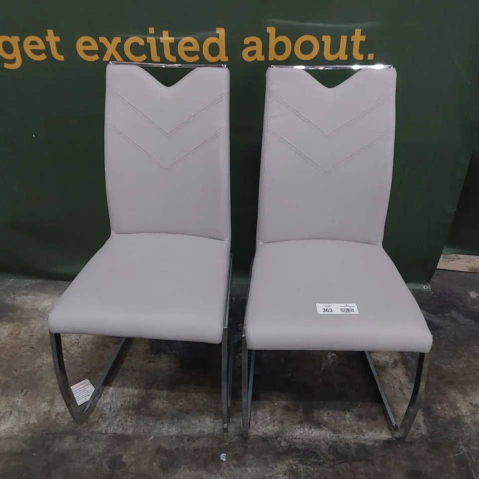 PAIR OF UPHOLSTERED DINING CHAIRS GREY PU ON CHROME FRAMES 