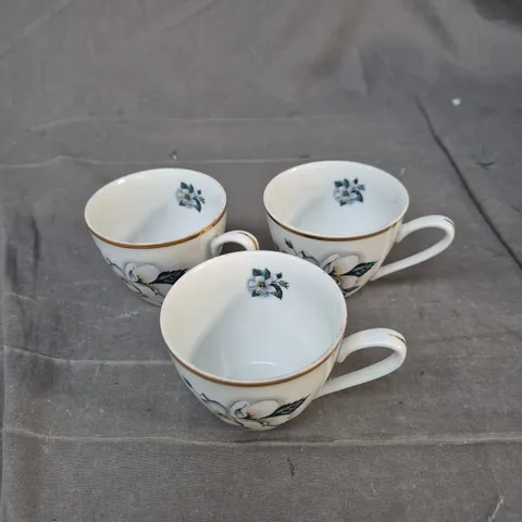 THREE PORCELAIN TEACUPS WITH BLUE FLORAL DESIGN AND GILT RIMS – CZECH/CZECHOSLOVAKIA MARK