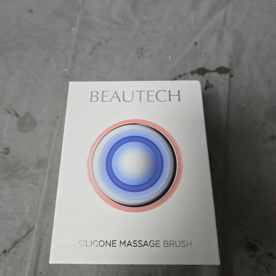 BEAUTECH SILICONE MASSAGE BRUSH – PINK CIRCULAR DEVICE WITH TEXTURED FLORAL SURFACE, USB CHARGING CABLE