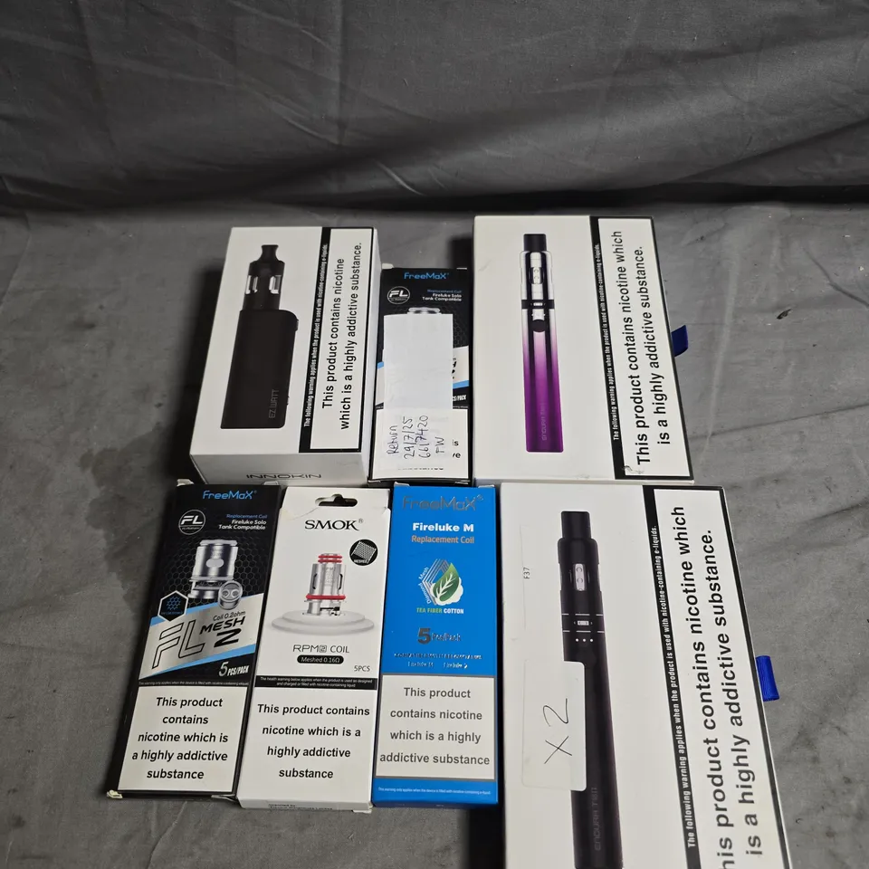 LOT OF APPROX 10 ASSORTED E-CIGS AND PARTS TO INCLUDE FREEMAX, SMOK AND GOTEK