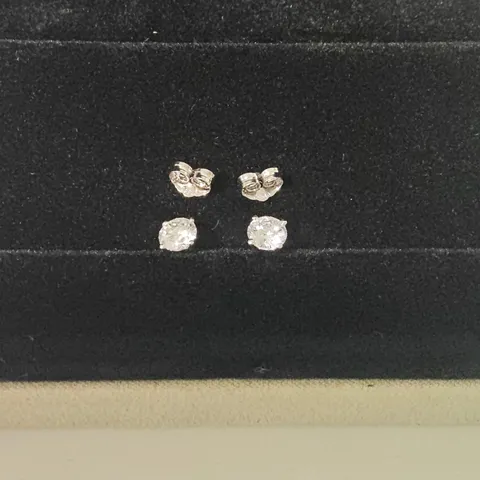 PLATINUM STUD EARRINGS SET WITH LAB GROWN DIAMONDS WEIGHING +-1.07CT