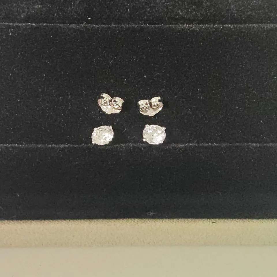 PLATINUM STUD EARRINGS SET WITH LAB GROWN DIAMONDS WEIGHING +-1.07CT