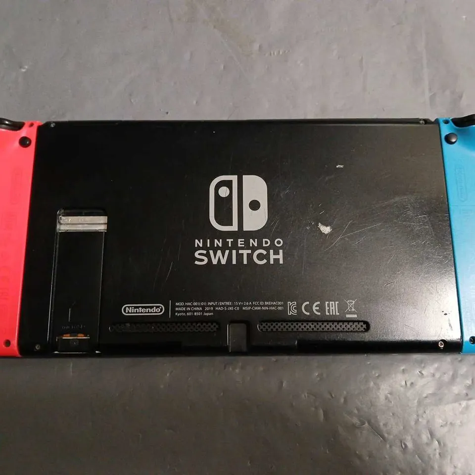 UNBOXED NINTENDO SWITCH CONSOLE WITH 51 WORLDWIDE GAMES CARTRIDGE