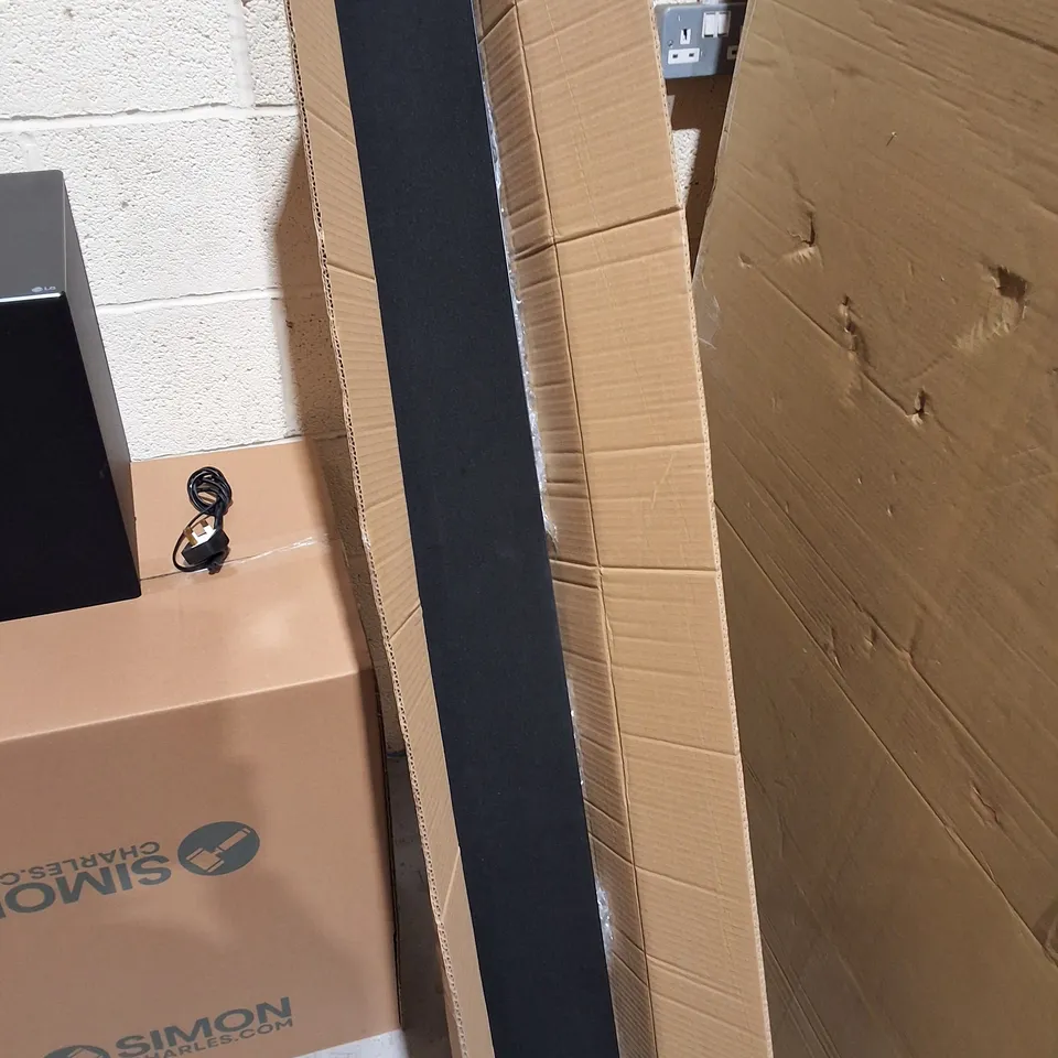 LG GX SOUNDBAR AND SUBWOOFER IN BLACK - 2 BOXES