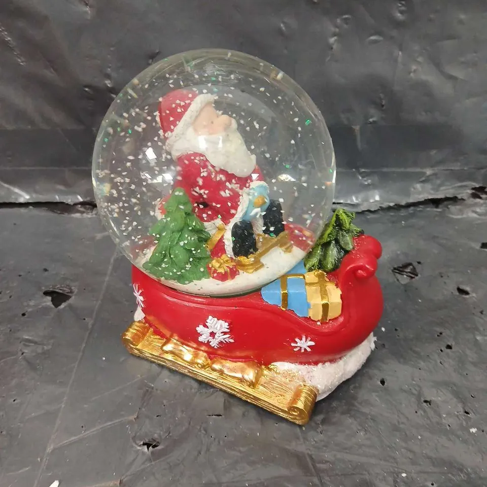 BOXED SANTA ON SLEIGH LED MUSICAL SNOWGLOBE 