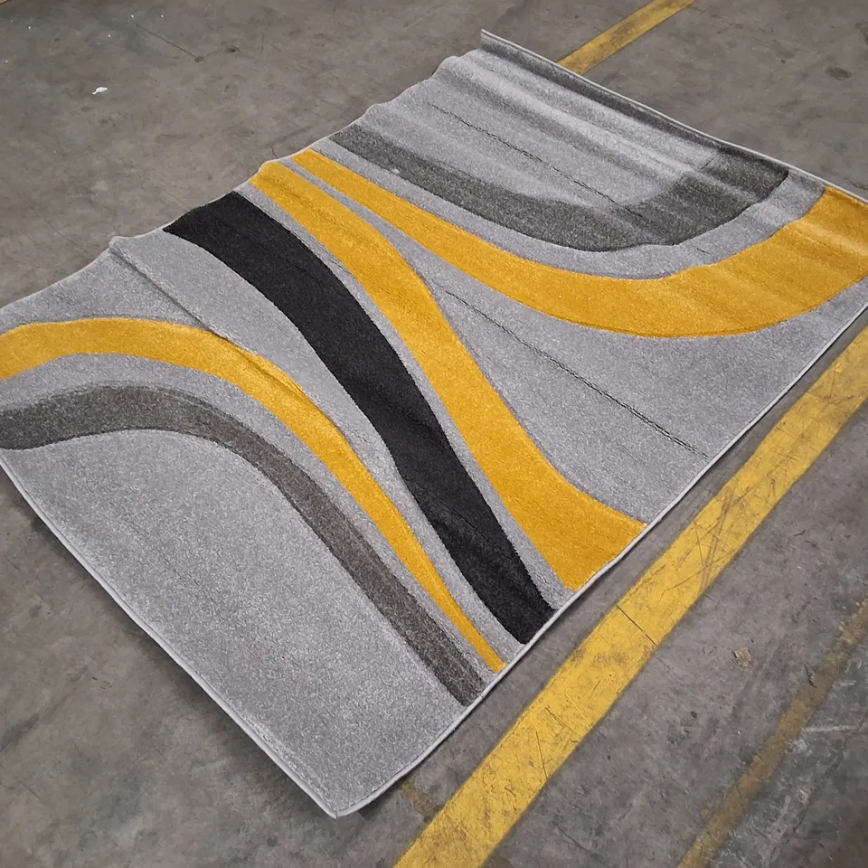 ABSTRACT PATTERNED AREA RUG – GREY, YELLOW AND BLACK APPROXIMATELY 140×200CM