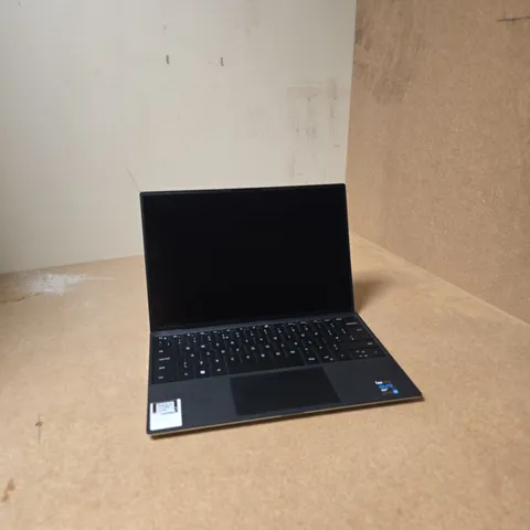 DELL LAPTOP – MODEL P117G - DAMAGE TO CASING 