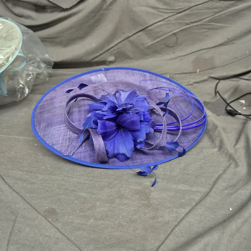 CAPELLI CONDICI PURPLE HAT WITH FLOWER DETAIL