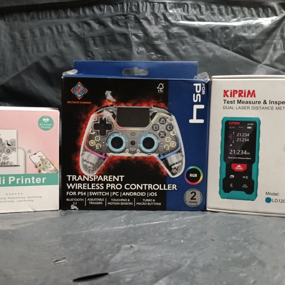 BOX OF APPROXIMATELY 20 ASSORTED HOUSEHOLD ITEMS TO INCLUDE MINI PRINTER, TRANSPARENT WIRELESS PRO CONTROLLER, DUAL LASER DISTANCE METER, ETC