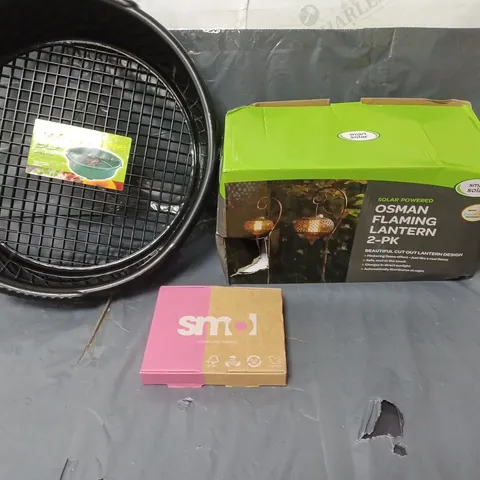APPROXIMATELY 20 ASSORTED HOUSEHOLD ITEMS TO INCLUDE GARDEN SIEVE, DISHWASHER TABLETS AND A PAIR OF FLAMING LANTERNS