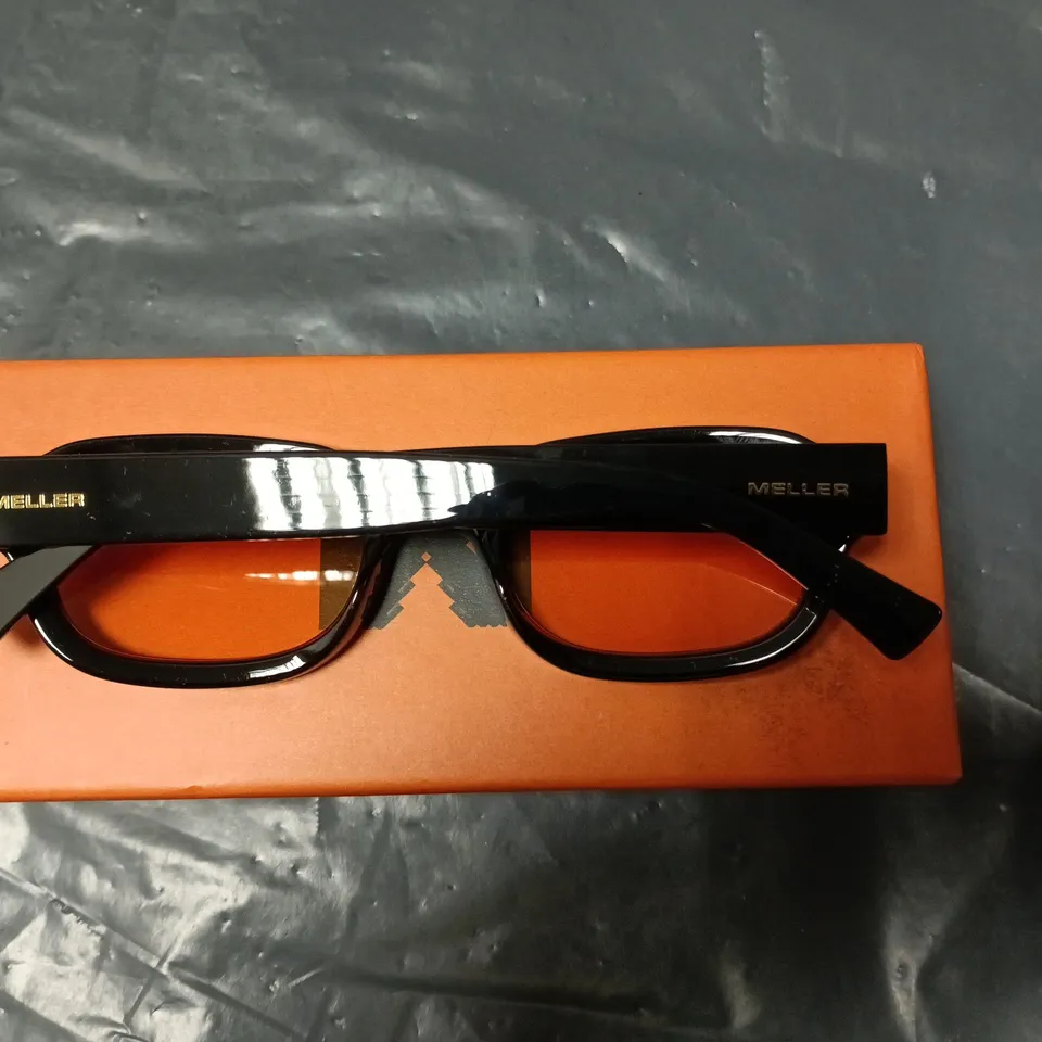 MELLER SUNGLASSES – BLACK FRAME WITH ORANGE LENSES, BOXED