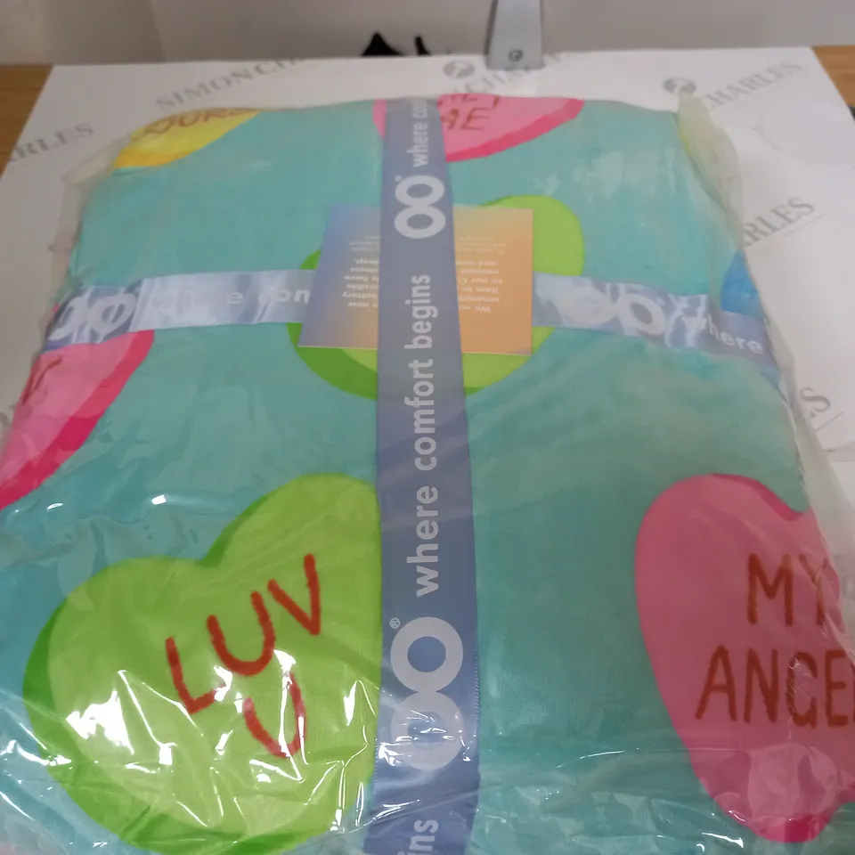 OODIE OVERSIZED WEARABLE BLANKET IN LOVE HEART CANDIES DESIGN