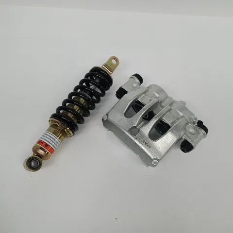 APPROXIMATELY 5 ASSORTED VEHICLE ITEMS TO INCLUDE SHOCK ABSORBER, ETC