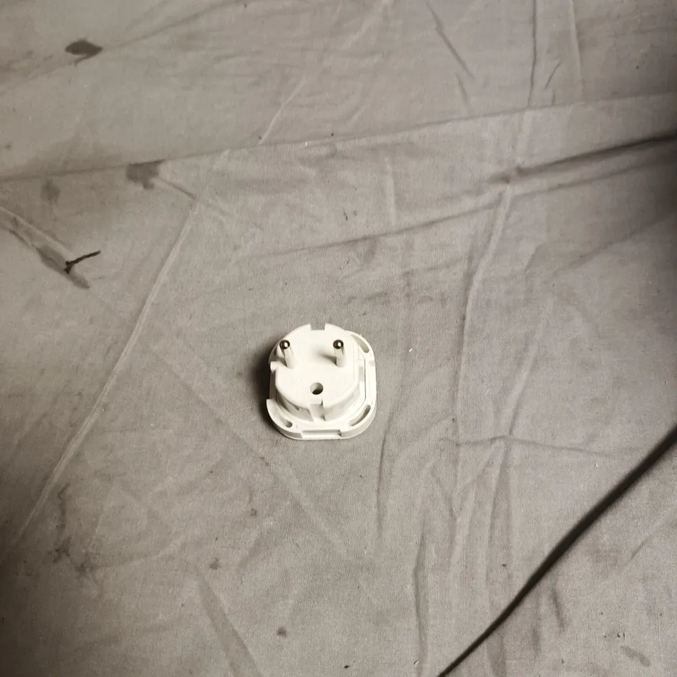 BOX OF APPROXIMATELY 50 X WHITE TWO‑PIN TRAVEL PLUG ADAPTERS 
