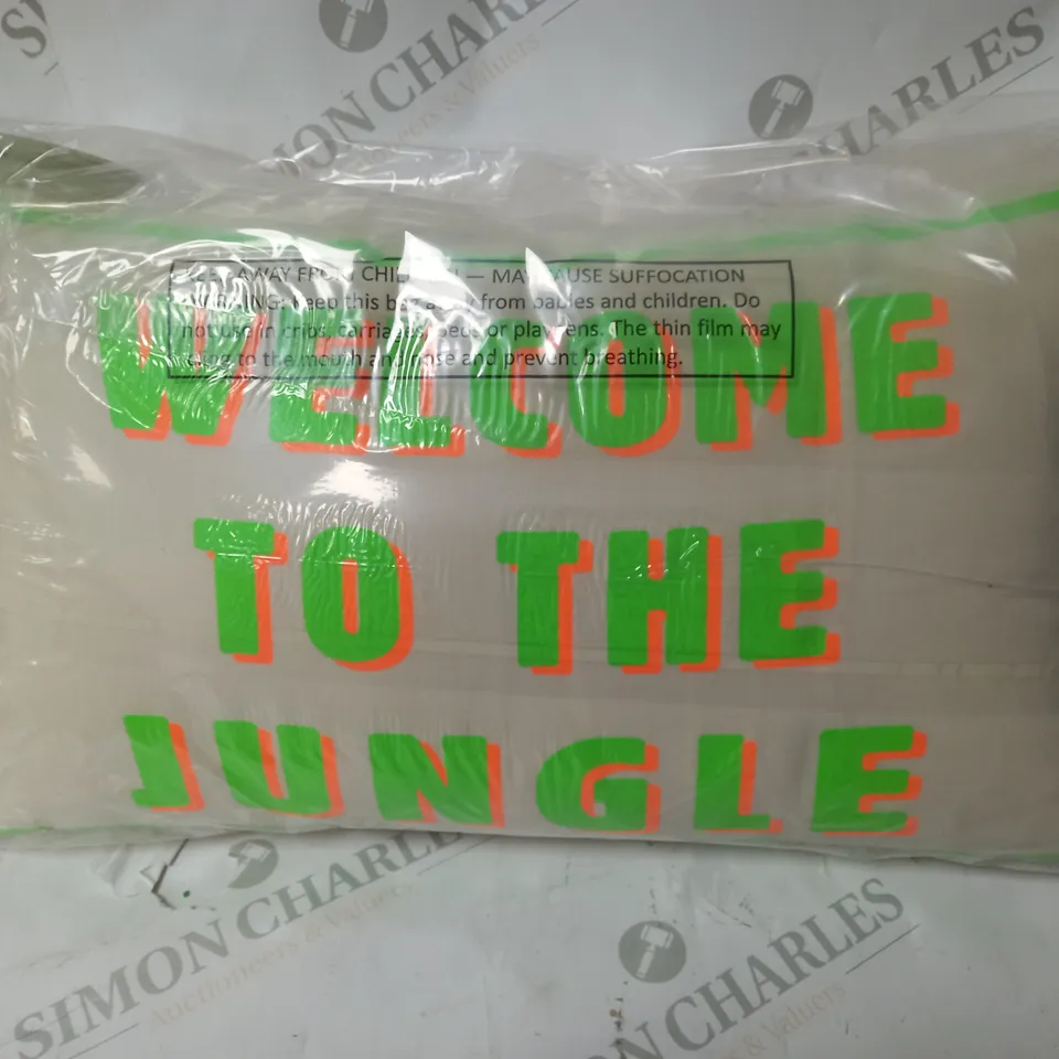 CREAM CUSHION WITH NEON WRITING