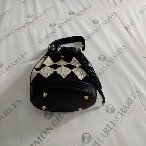 BLACK & WHITE CHEQUARED STUDDED STRAP BAG