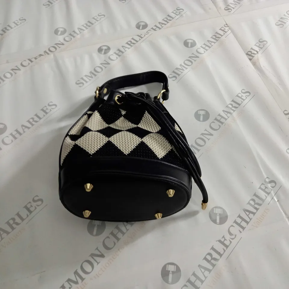 BLACK & WHITE CHEQUARED STUDDED STRAP BAG