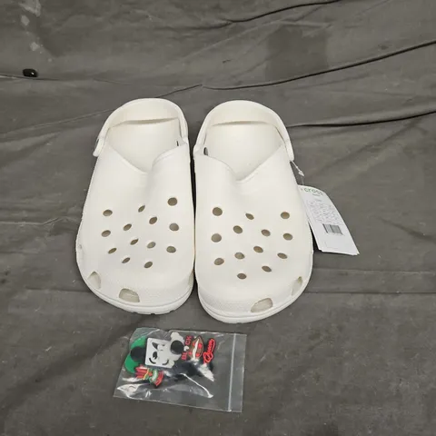 PAIR OF CROCS CLASSIC CLOGS IN OFF WHITE SIZE UK M8/W9