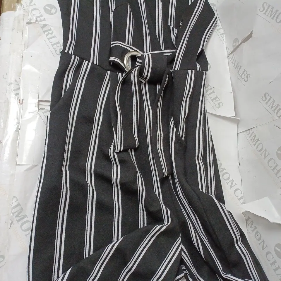 APPROXIMATELY 10 CLOTHING INCLUDING: CREAM SLEEVELESS PUFFER JACKET, LONG SLEEVE SHIRTS AND JUMPSUITS (ALL OF DIFFERENT SIZES)