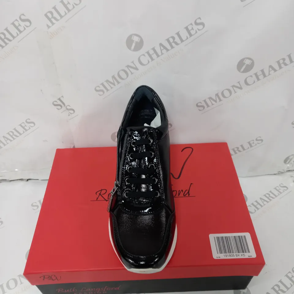 BOXED PAIR OF RUTH LANGSFORD WEDGE TRAINERS IN BLACK SIZE 5