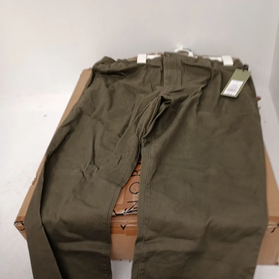 BOX OF APPROXIMATELY 15 GREEN CHINOS IN ASSORTED SIZES