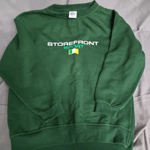STOREFRONT SPORTS IRISH JUMPER IN GREEN - SMALL