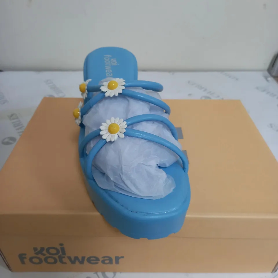 BRAND NEW BOXED PAIR OF KOI VEGAN LEATHER BLOOMING DAISY OASIS STRAPPY SLIDERS IN BLUE UK SIZE 7