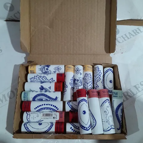 APPROXIMATELY 15 ASSORTED KORRES LIP BALM STICKS IN ASSORTED FLAVOURS TO INCLUDE MINT, MULBERRY, THYME HONEY ETC