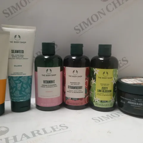BOX OF APPROX 6 ASSORTED THE BODY SHOP PRODUCTS TO INCLUDE VITAMIN C CLEANSING POLISH, STRAWBERRY SHOWER GEL, JAMAICAN BLACK CASTOR OIL, ETC