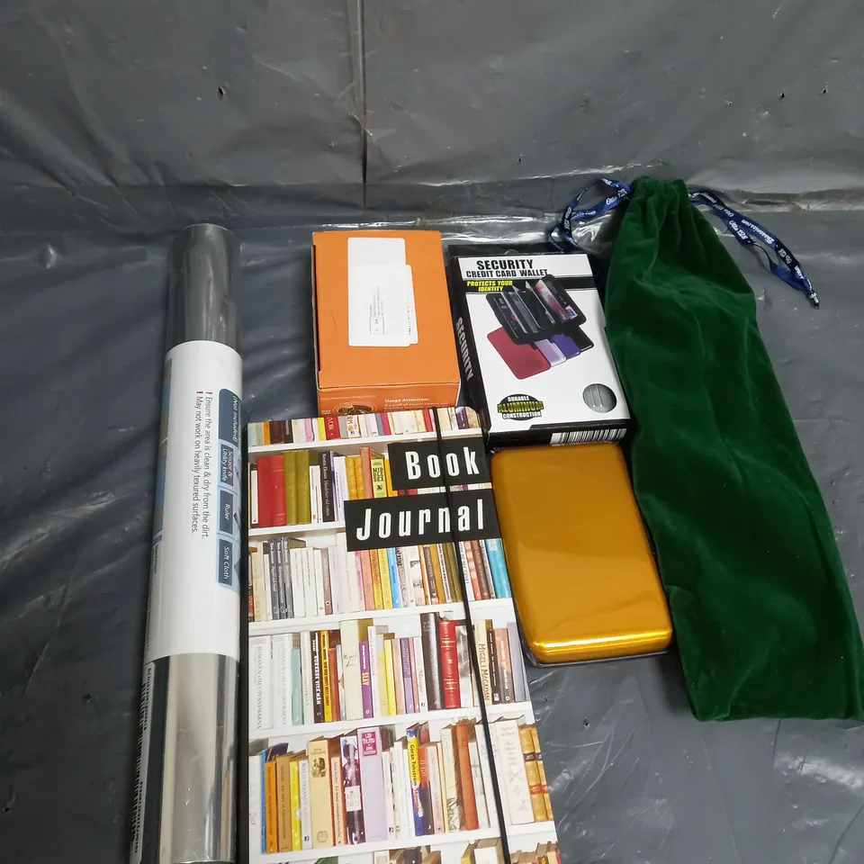 APPROXIMATELY 10 ASSORTED HOUSEHOLD ITEMS TO INCLUDE BOOK JOURNAL , CREDIT CARD WALLET , INSTALLATION , ETC 