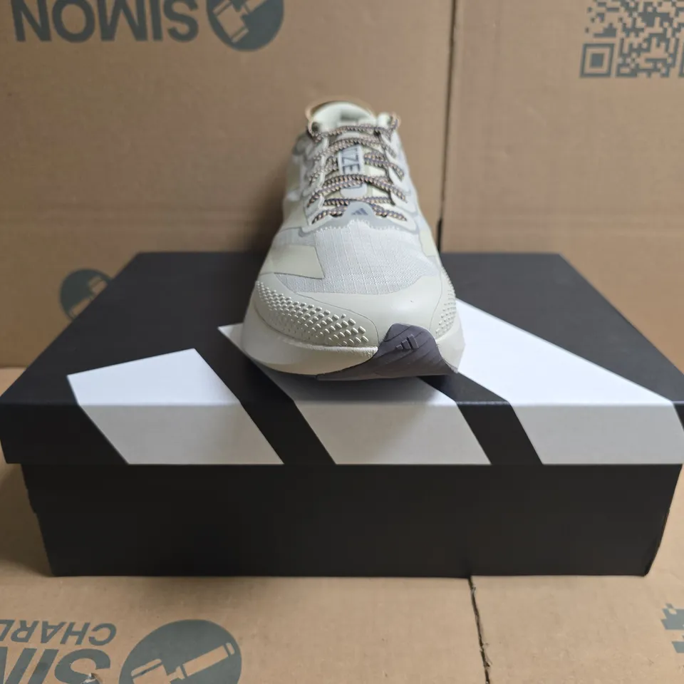 BOXED PAIR OF ADIDAS ADIZERO EVO SLATR TRAINERS IN LIGHT TAUPE SIZE UK 10