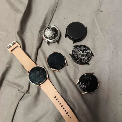 APPROXIMATELY 30 ASSORTED DAMAGED/FAULTY SMARTWATCH UNITS