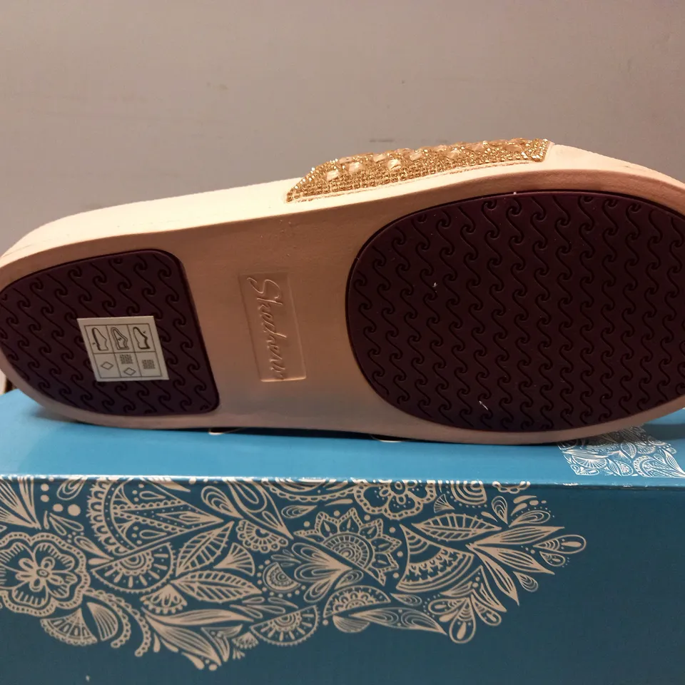 BOXED PAIR OF SKECHERS SANDALS IN ROSE GOLD SIZE 4