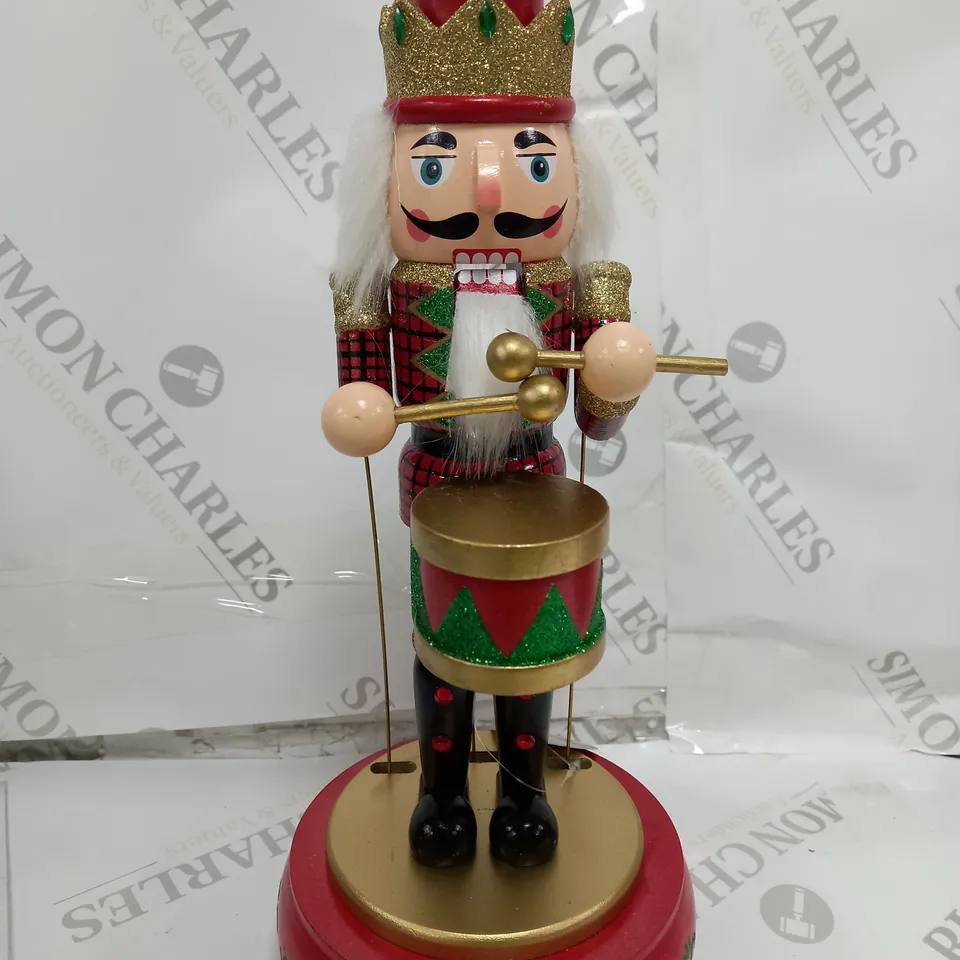 FESTIVE 32CM WOODEN ANIMATED MUSICAL NUTCRACKER