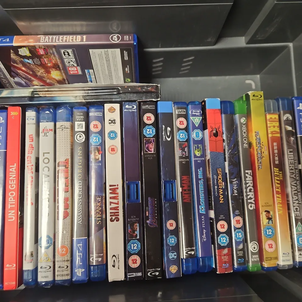 APPROXIMATELY 24 ASSORTED DVDS & GAMES TO INCLUDE GTA V (PS4), SPIDERMAN HOMECOMING, THOR RAGNORAK, ETC