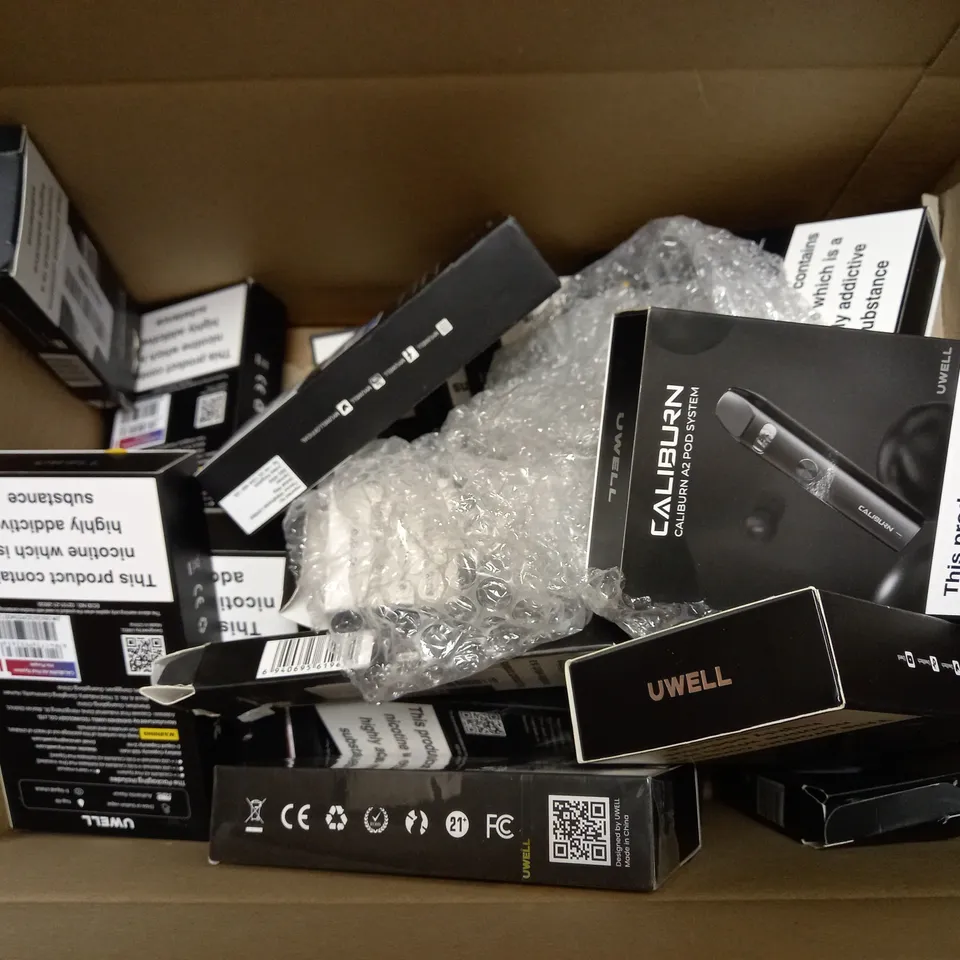 BOX OF APPROX 20 VAPING DEVICES AND ACCESSORIES TO INCLUDE CALIBURN A2 POD SYSTEM, CALIBURN GK2 POD SYSTEM AND CALIBURN PORTABLE SYSTEM KIT