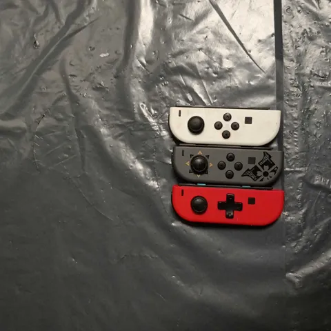 NINTENDO SWITCH JOY-CON CONTROLLERS – SET OF 3 (WHITE, GREY & RED)