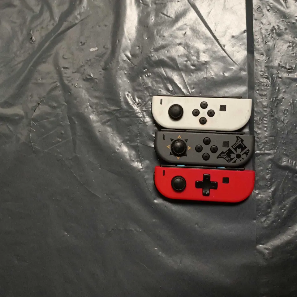 NINTENDO SWITCH JOY-CON CONTROLLERS – SET OF 3 (WHITE, GREY & RED)