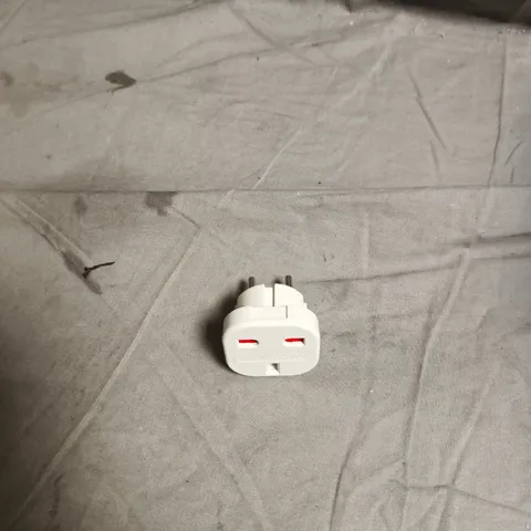 BOX OF APPROXIMATELY 50 X WHITE TWO‑PIN TRAVEL PLUG ADAPTERS 
