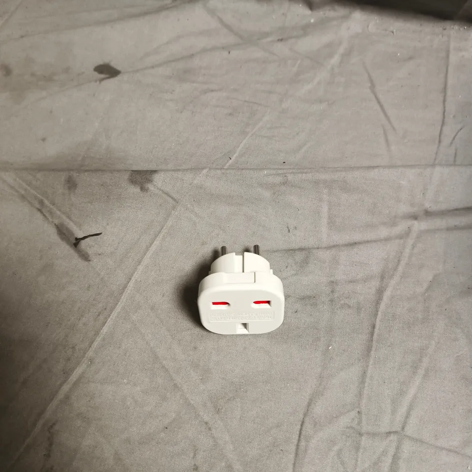 BOX OF APPROXIMATELY 50 X WHITE TWO‑PIN TRAVEL PLUG ADAPTERS 